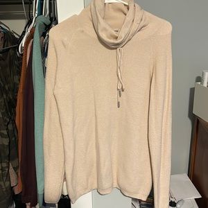 Pink turtleneck sweater